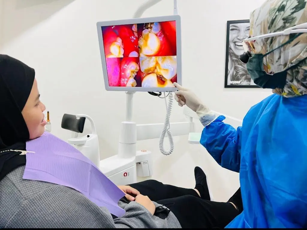 A young patient being treated at Mawarni Dental Clinic