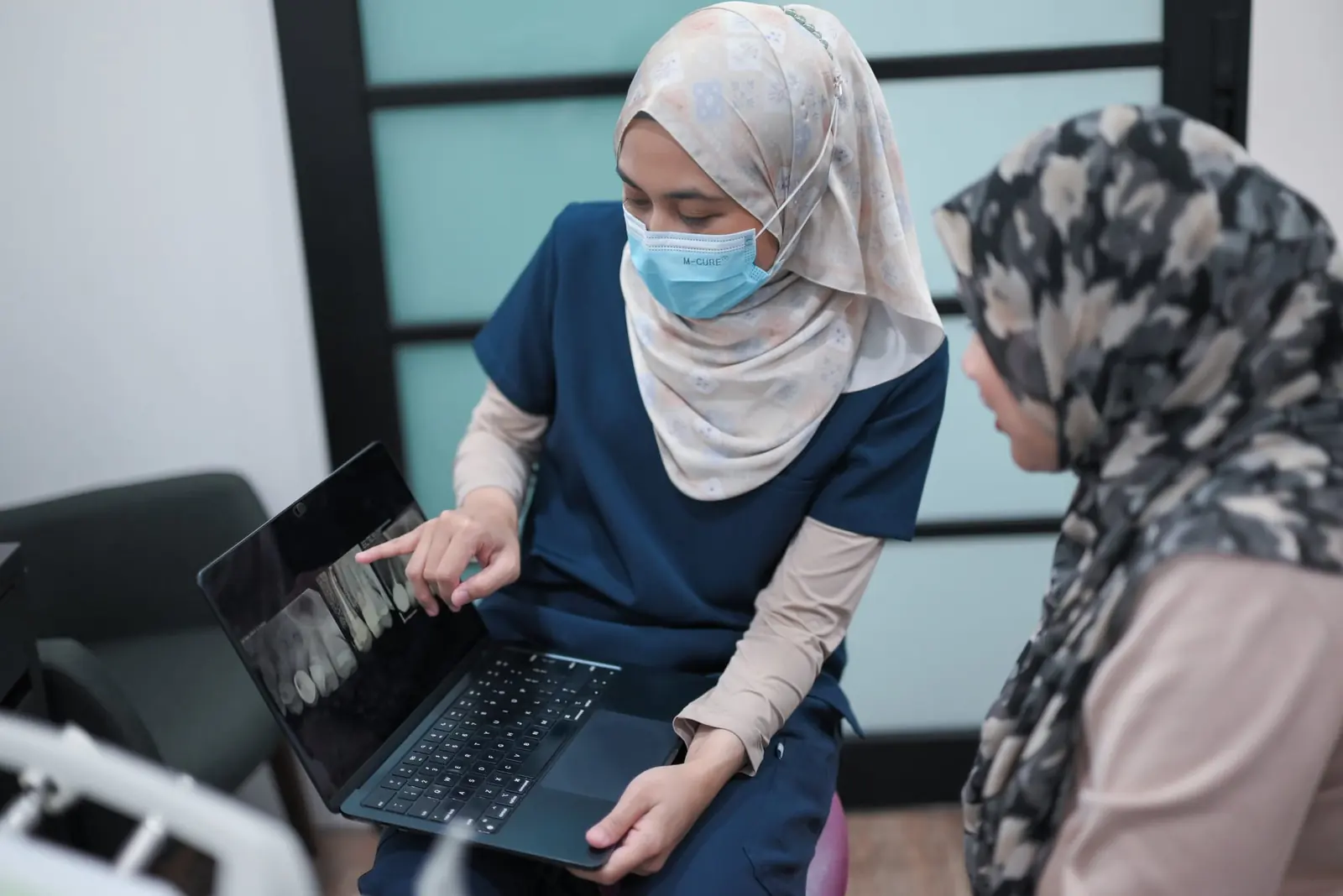 Reviewing intra-oral camera images with a patient